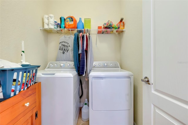 laundry area with washing machine and dryer