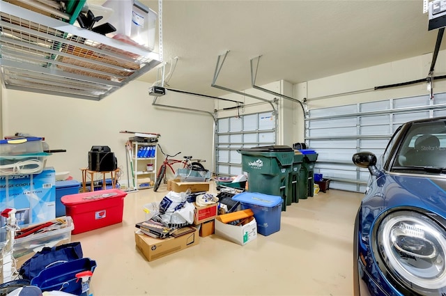 garage featuring a garage door opener