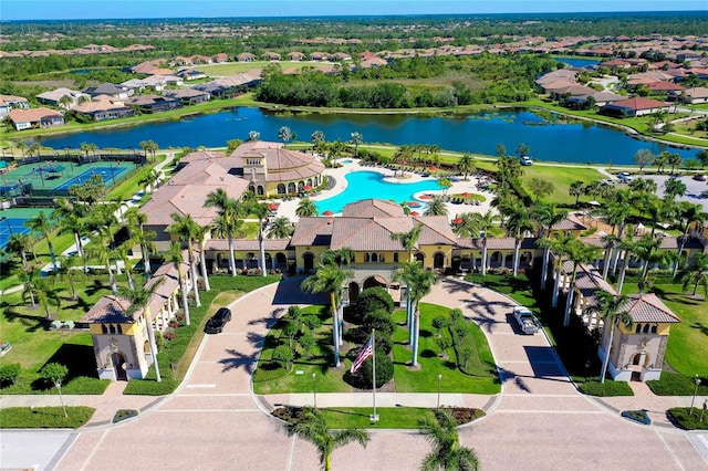 birds eye view of property featuring a water view