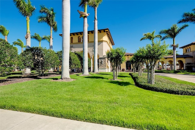 exterior space featuring a front lawn