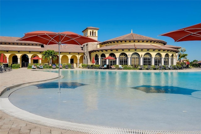 view of swimming pool featuring a patio area