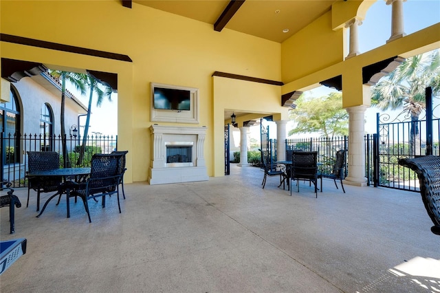 view of patio / terrace featuring an outdoor fireplace