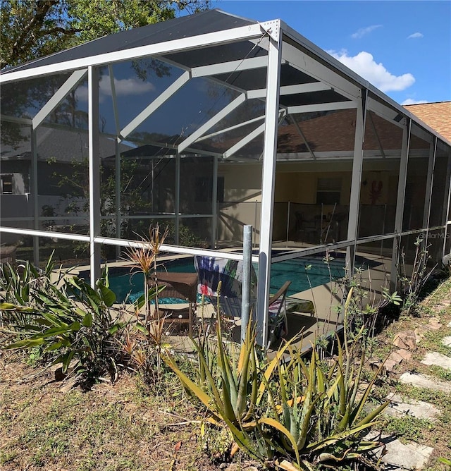 pool featuring glass enclosure