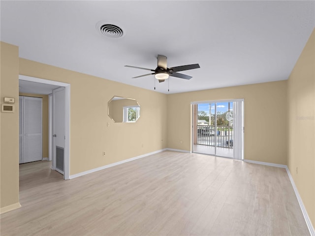 unfurnished room with ceiling fan and light hardwood / wood-style floors