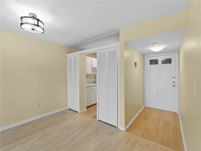 hallway featuring light hardwood / wood-style floors