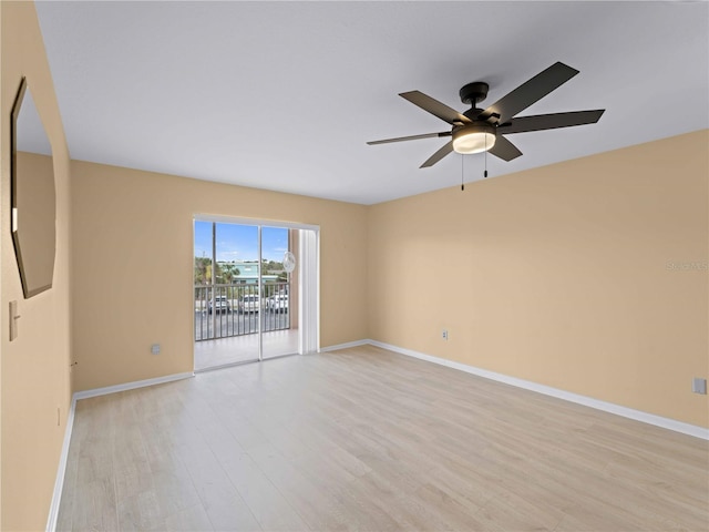 unfurnished room featuring ceiling fan and light hardwood / wood-style floors