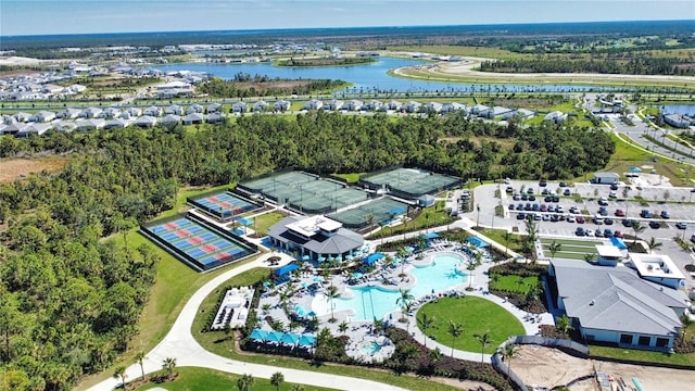 birds eye view of property featuring a water view