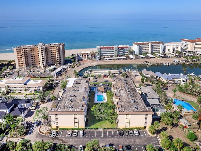 bird's eye view featuring a view of city and a water view