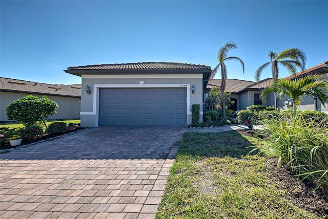 view of front of home with a garage