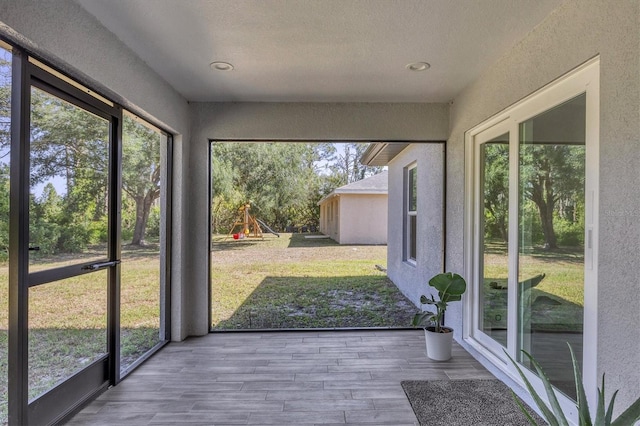 view of unfurnished sunroom