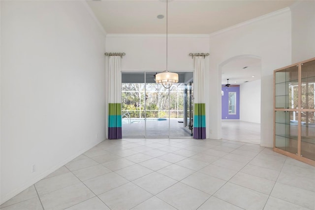 unfurnished dining area with ornamental molding and light tile patterned floors