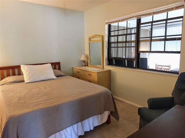 bedroom with tile patterned flooring