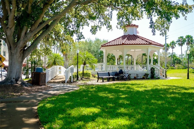 view of community featuring a yard and a gazebo