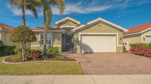 view of front of property featuring a garage