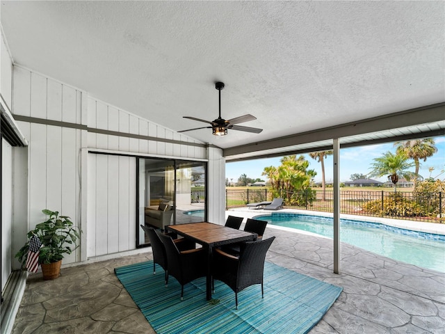 exterior space featuring vaulted ceiling and ceiling fan