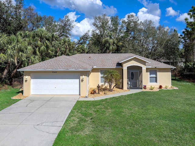 ranch-style home with a garage and a front yard