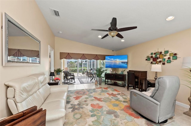 living room featuring vaulted ceiling, ceiling fan, and light tile patterned flooring