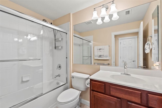 full bathroom with vanity, enclosed tub / shower combo, and toilet