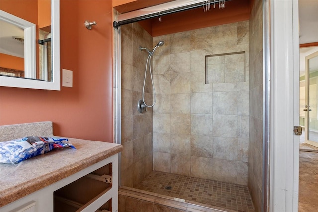 bathroom featuring a tile shower