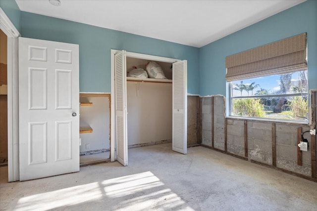 unfurnished bedroom with a closet