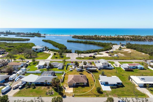 drone / aerial view featuring a water view