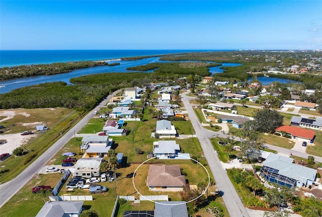 bird's eye view with a water view