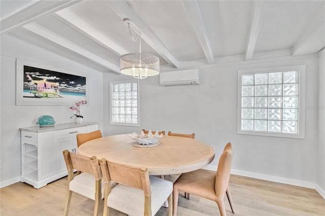 dining space with an inviting chandelier, an AC wall unit, light wood-type flooring, beamed ceiling, and baseboards