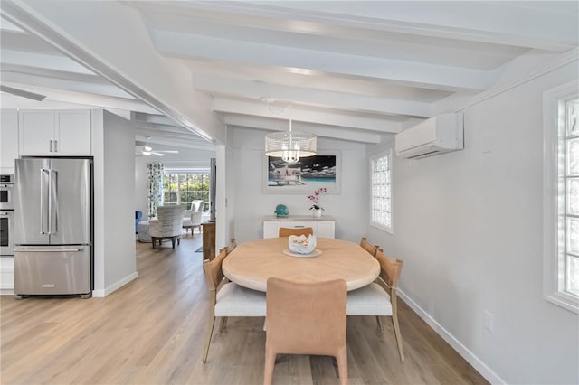 dining space featuring an AC wall unit, light wood finished floors, beam ceiling, and baseboards