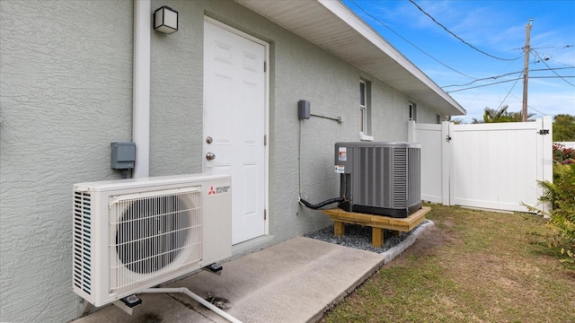 exterior details featuring central AC and ac unit