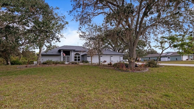 ranch-style house with a front yard