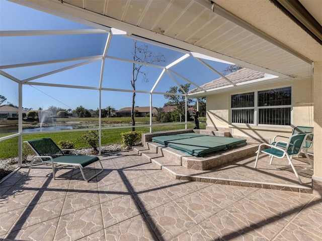 view of patio / terrace with glass enclosure