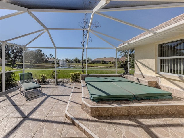 view of patio / terrace with glass enclosure