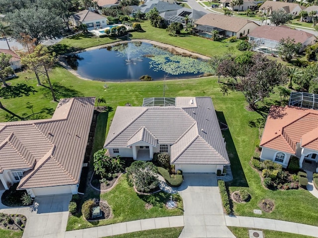 bird's eye view with a water view