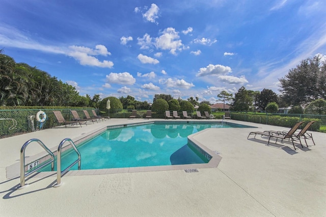 view of pool featuring a patio area