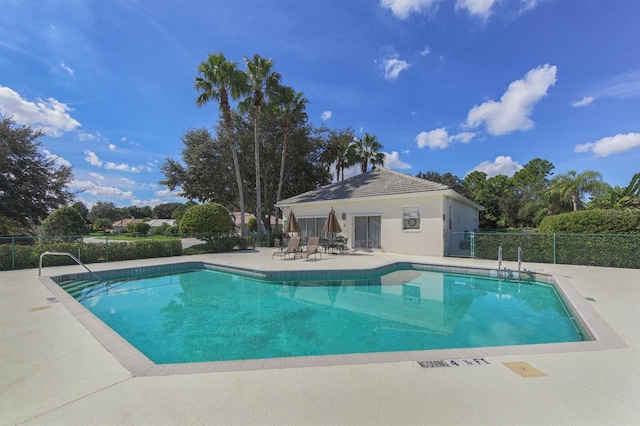 view of pool with a patio area