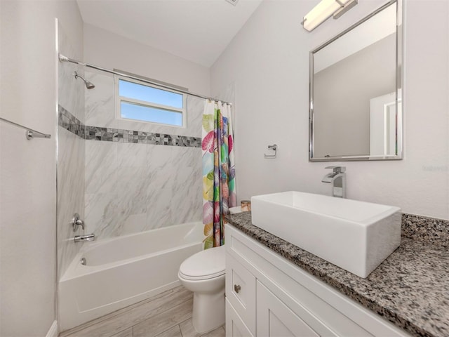 full bath featuring shower / bath combination with curtain, vanity, toilet, and wood finished floors