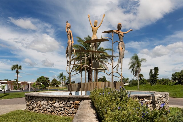 view of community featuring fence