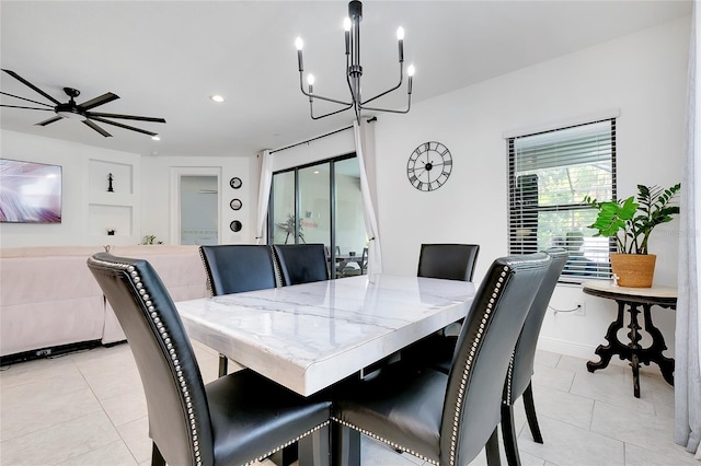 dining room featuring recessed lighting, light tile patterned flooring, baseboards, and ceiling fan with notable chandelier