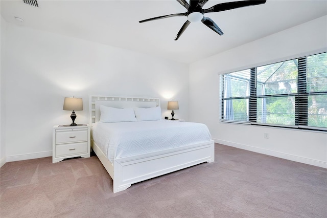 bedroom featuring carpet flooring, ceiling fan, and baseboards