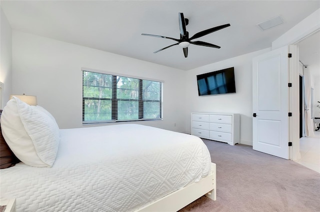 carpeted bedroom featuring ceiling fan