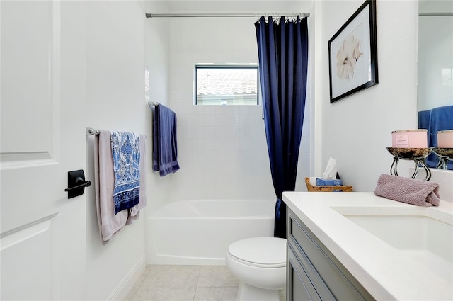 bathroom featuring shower / bath combination with curtain, tile patterned flooring, vanity, and toilet