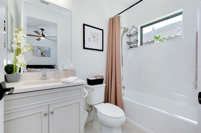 full bathroom featuring vanity, shower / bath combination with curtain, toilet, and tile patterned floors