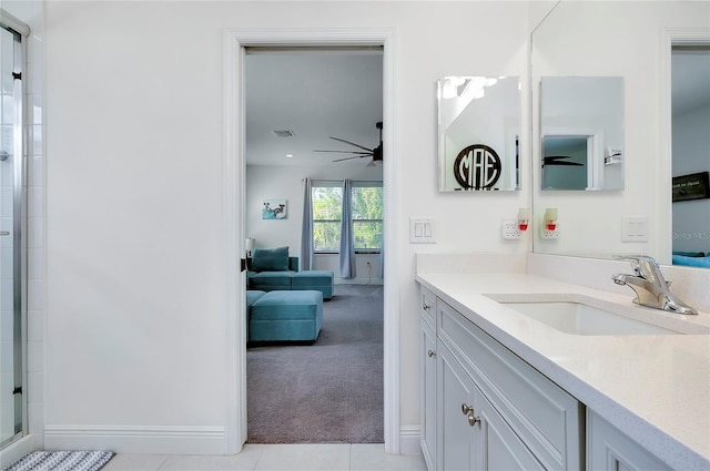 ensuite bathroom featuring visible vents, vanity, ensuite bath, tile patterned flooring, and tiled shower