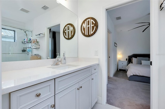 full bath featuring a shower with shower door, visible vents, and ceiling fan