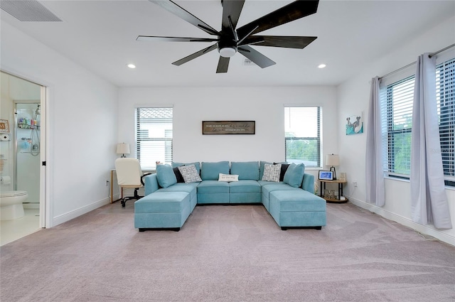 living area featuring ceiling fan, recessed lighting, carpet floors, visible vents, and baseboards