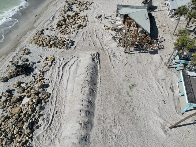 bird's eye view with a view of the beach and a water view