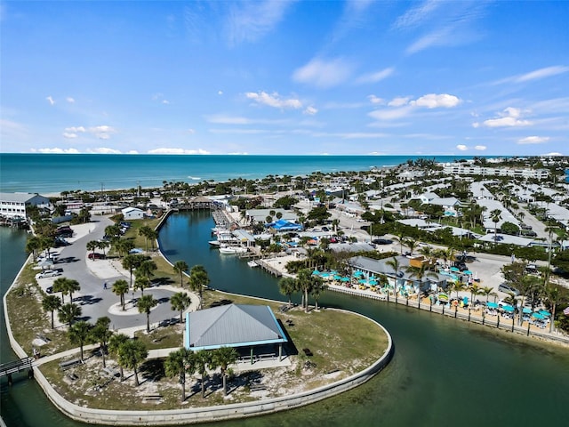 birds eye view of property with a water view and a residential view