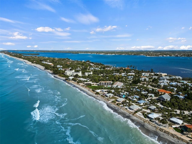 aerial view with a view of the beach and a water view