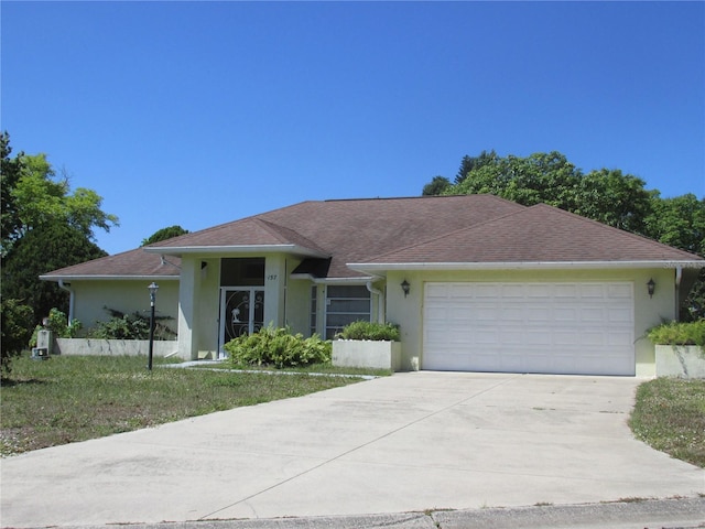 ranch-style home with a garage