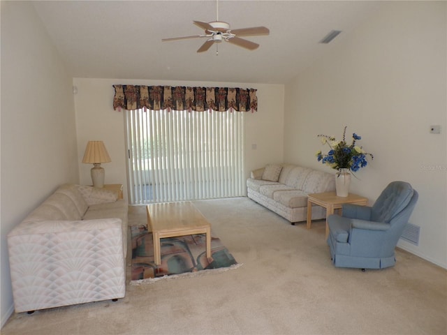 living room featuring lofted ceiling, carpet, and ceiling fan